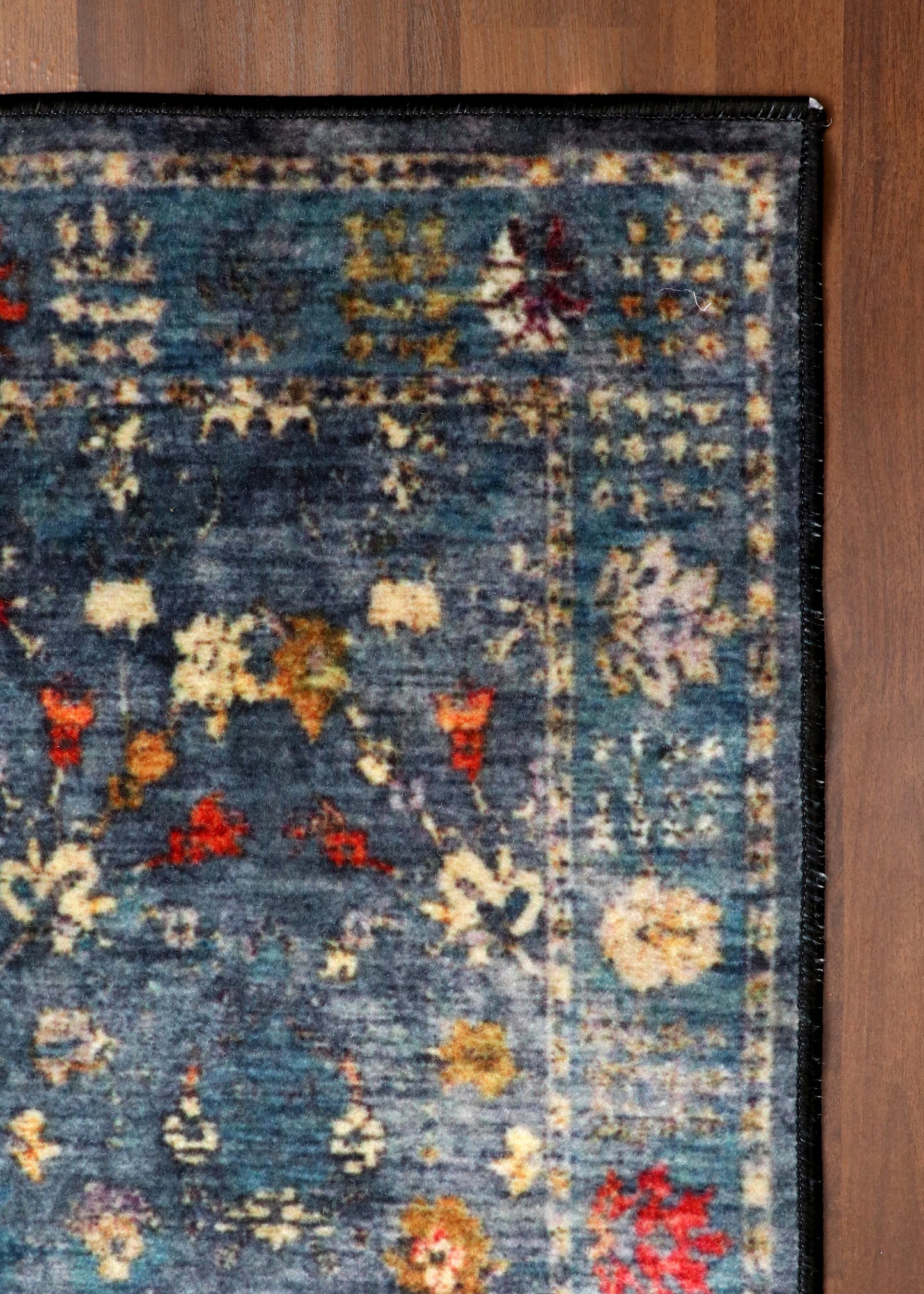 Dark Blue Distressed Rug with Floral Pattern