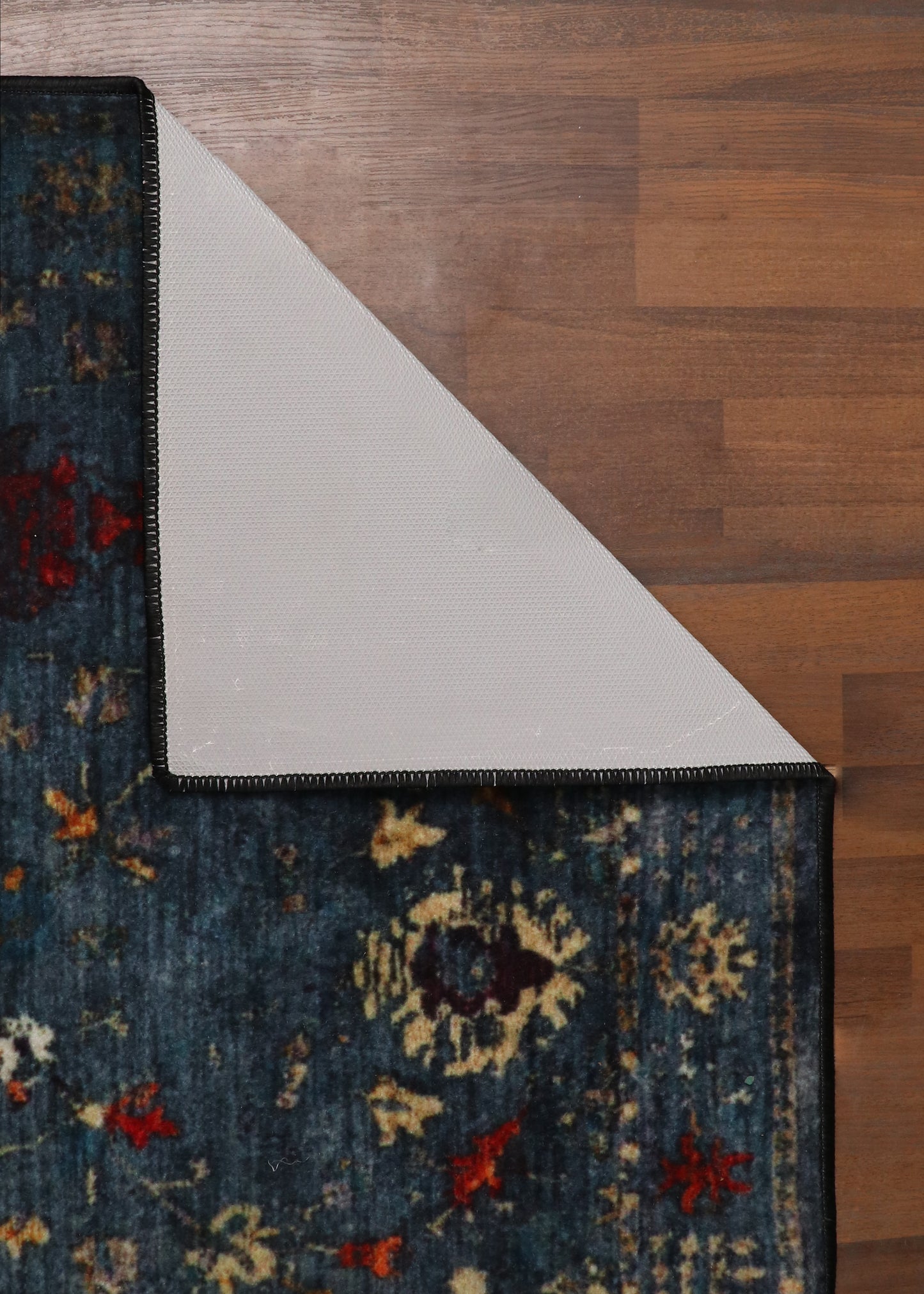 Dark Blue Distressed Rug with Floral Pattern