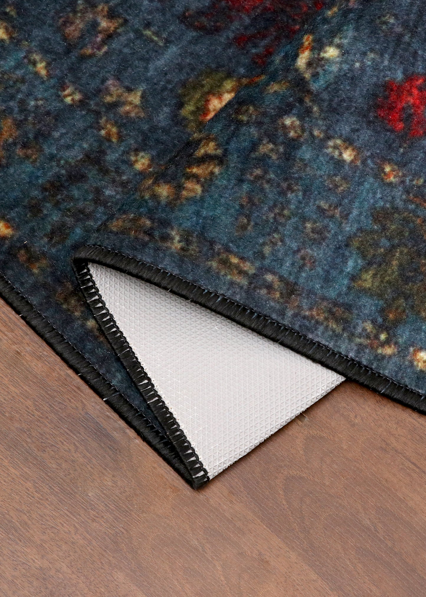 Dark Blue Distressed Rug with Floral Pattern