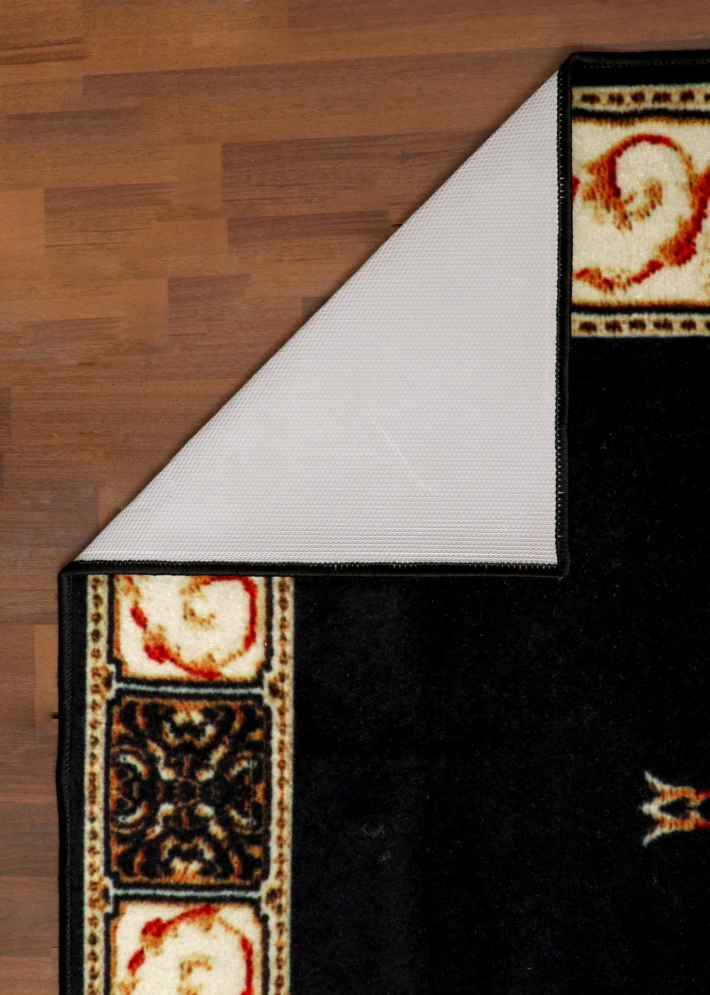 Majestic Black Area Rug with Antique Pattern and Cream Border Detailing