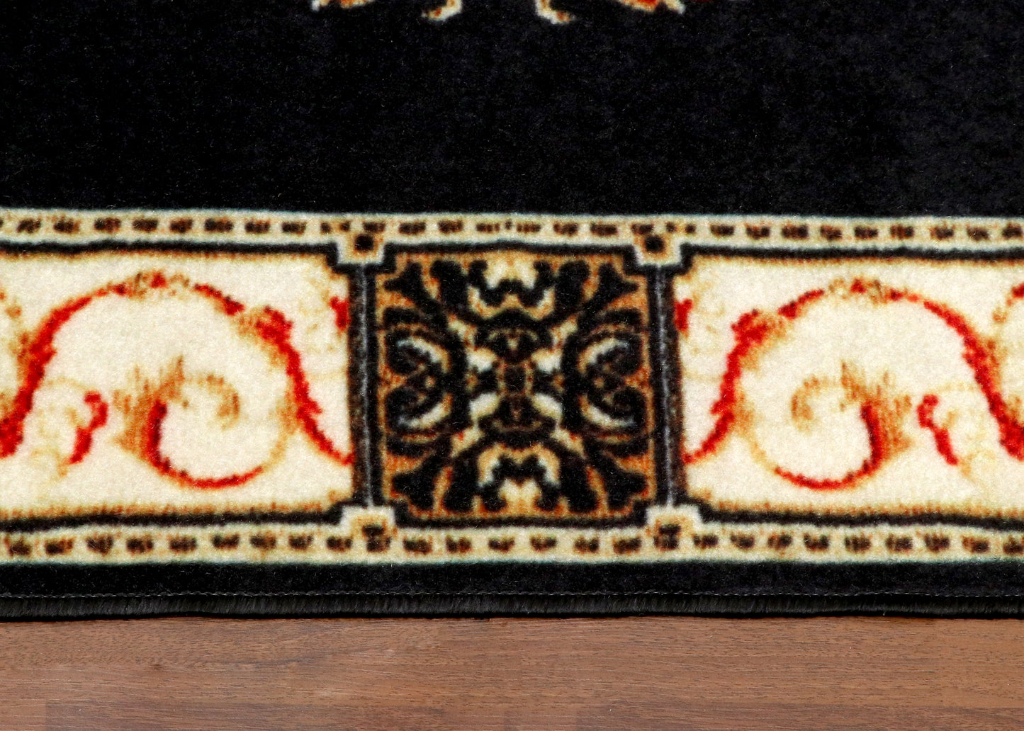 Majestic Black Area Rug with Antique Pattern and Cream Border Detailing