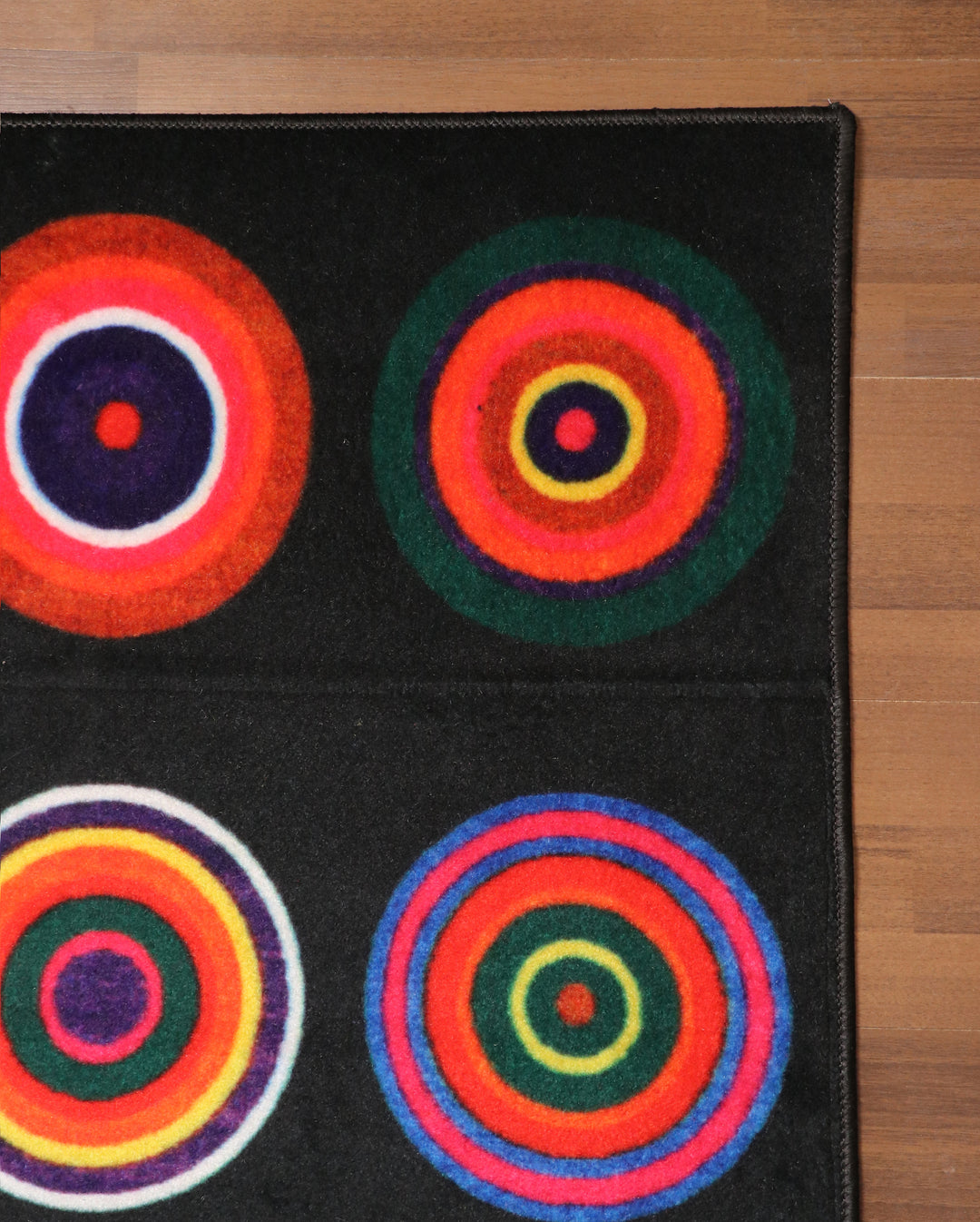 Black  with Multi Color Circular Print Rectangle Kids Non Woven Rug with Non Slip TPR Backing For Everyday Use