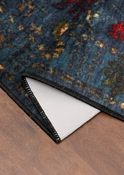 Dark Blue Distressed Rug with Floral Pattern