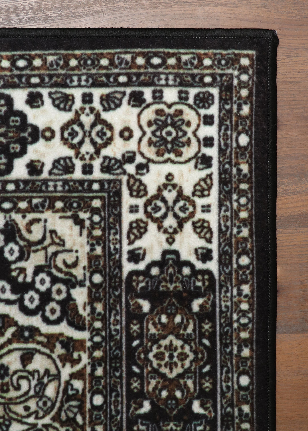 Elegant Black and Cream Non-Woven Medallion Rug