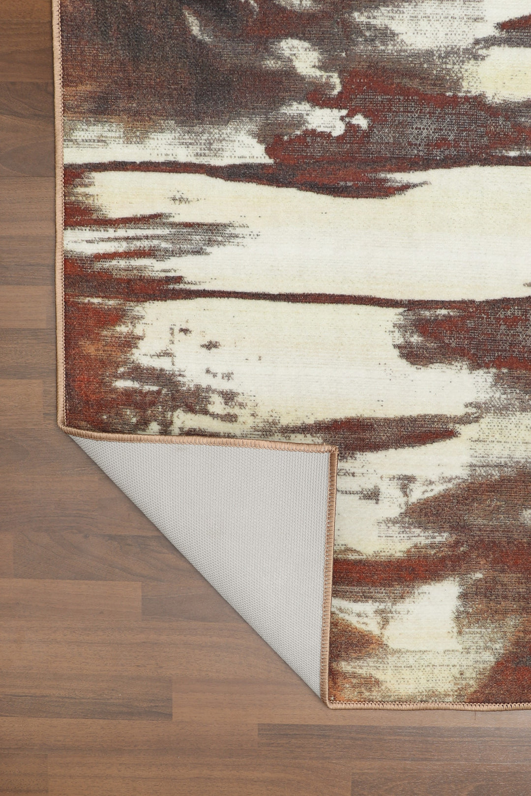 Brown and Beige Abstract Print Rectangle Non Woven Rug with Non Slip TPR Backing For Everyday Use