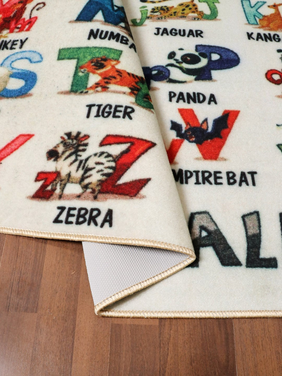 Beige with Multi Color Alphabet Print Rectangle Kids Non Woven Rug with Non Slip TPR Backing For Everyday Use