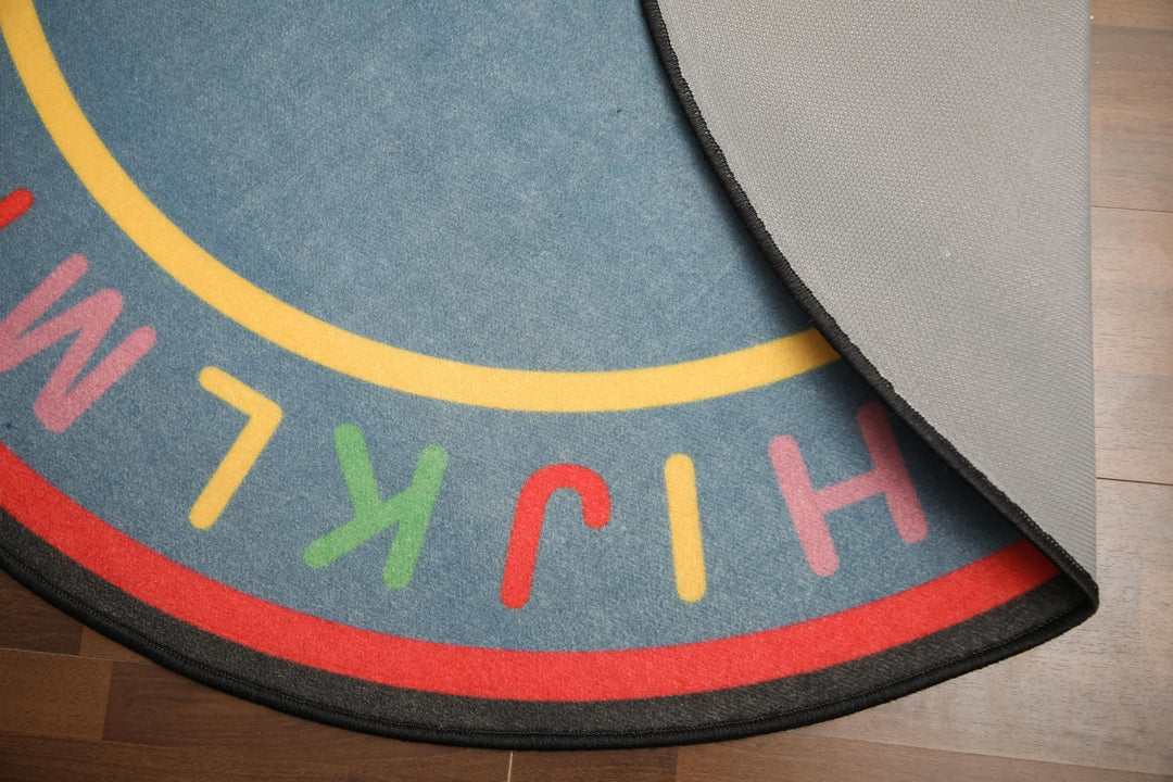 Blue Color with Multi Color Alphabet Print Round Non Woven Rug with Non Slip TPR Backing For Everyday Use
