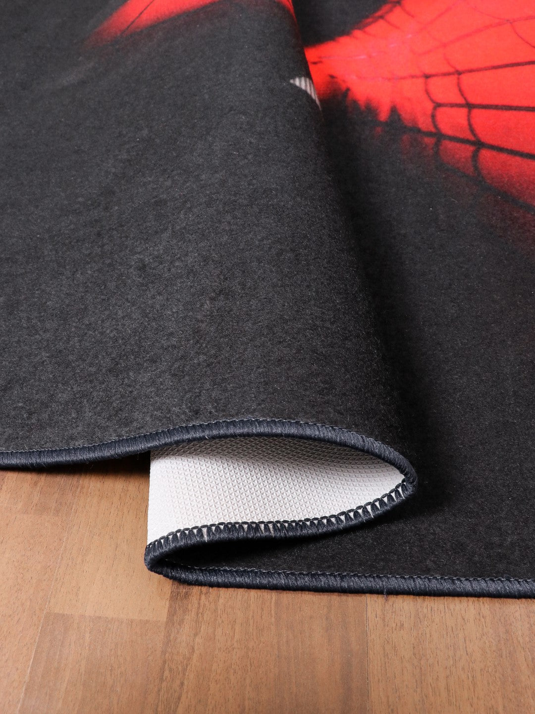 Black with Red Spider Man Rectangle Kids Non Woven Rug with Non Slip TPR Backing For Everyday Use
