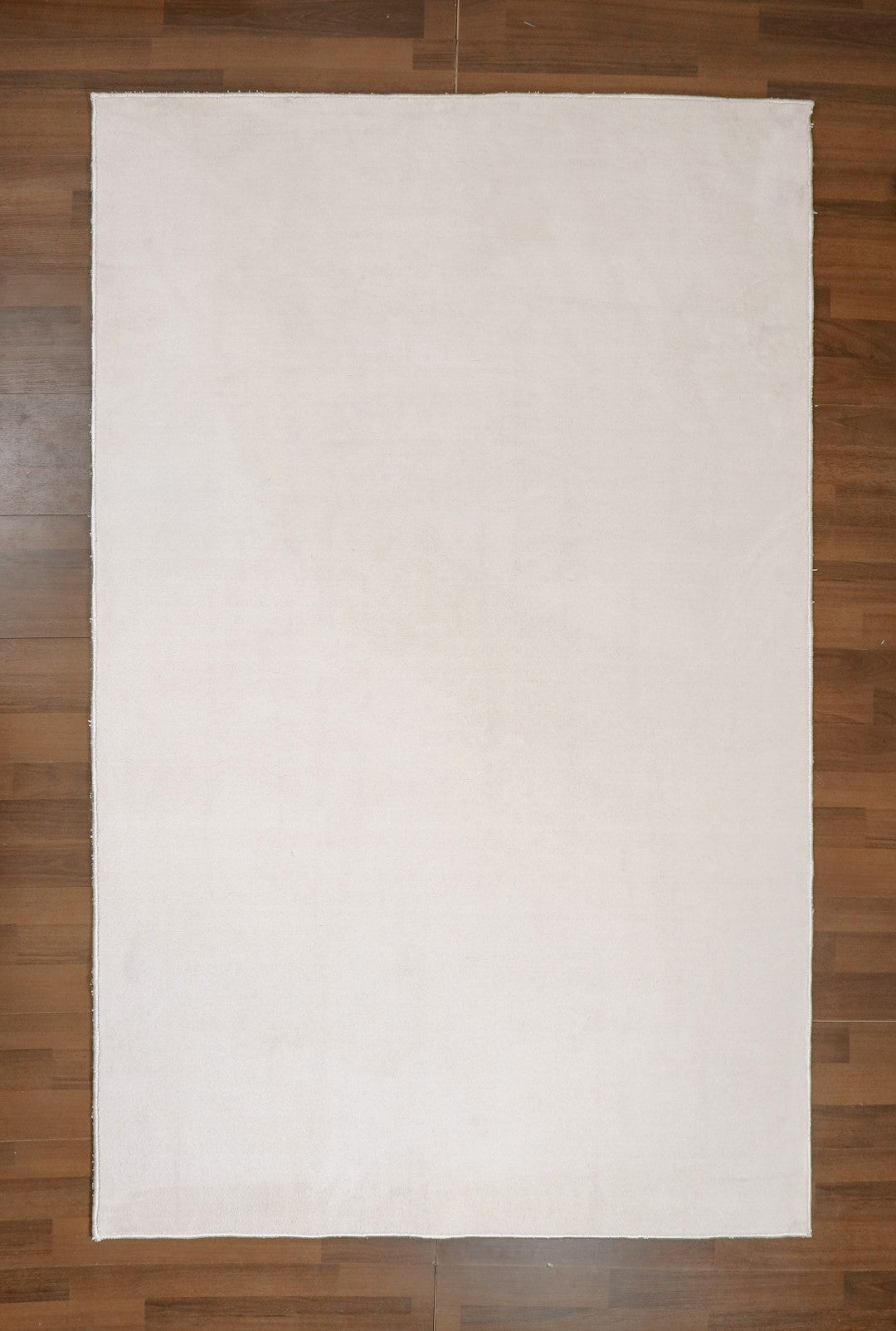 Beige Plain Print Non Woven Tufted Rectangle Rug with Doted Back For Everyday Use